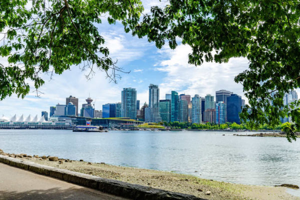 Provincial-health-care-vancouver-canada view of downtown Vancouver near seawall with water and tall buildings in the background