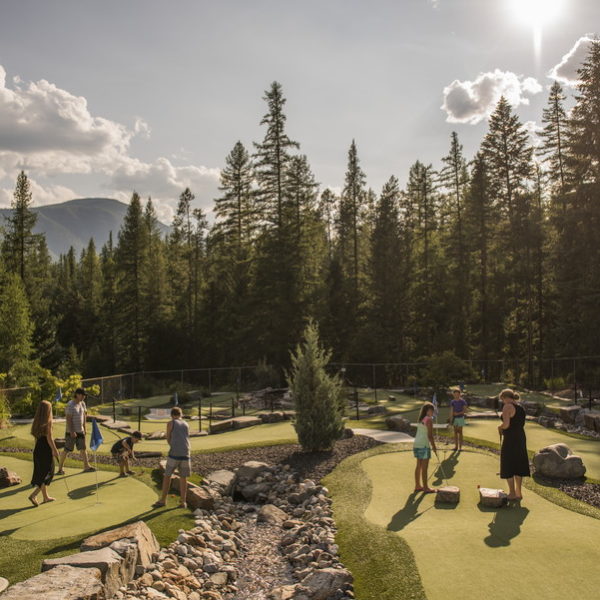 People playing golf in the park